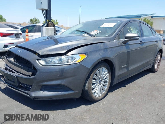 2015 Ford Fusion SE Hybrid with VIN 3FA6P0LU4FR305908, listed as a IAAI auction lot 42539627 with 91,467 mi miles and . Bid and sale history available at DreamBid. Image 2.