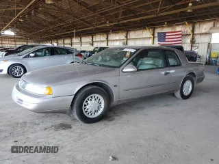 1995 Mercury Cougar z VIN 1MELM62W2SH613956, wystawiony jako Copart lot #49742425 z przebiegiem 94 806 mil mil oraz Tytuł czysty. Historia ofert i sprzedaży dostępna na DreamBid. Obrazek 1.