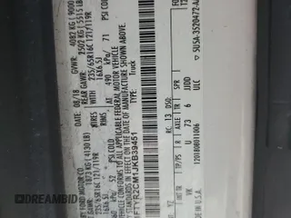 2018 Ford Transit z VIN 1FTYR2CM1JKB39451, wystawiony jako Copart lot #70852124 z przebiegiem 230 942 mil mil oraz Tytuł czysty. Historia ofert i sprzedaży dostępna na DreamBid. Obrazek 12.