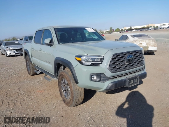 2022 Toyota Tacoma SR with VIN 3TMCZ5AN7NM501028, listed as a IAAI auction lot 42537868 with 42,186 mi miles and . Bid and sale history available at DreamBid. Image 1.