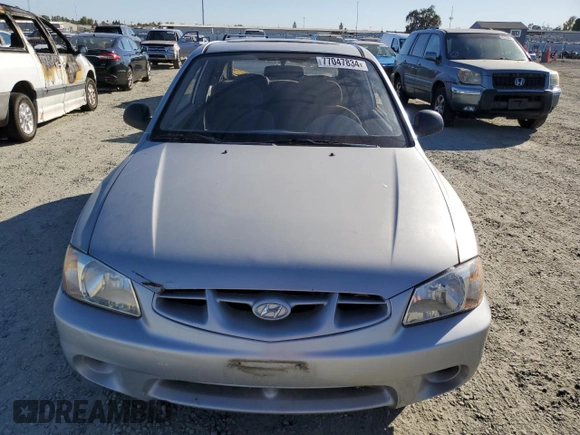 2002 Hyundai Accent с VIN KMHCF35G62U203274, выставлен на аукционе Copart как лот 77047834 с пробегом 90 442 миль миль и Списание • Salvage title. История ставок и продаж доступна на DreamBid. Изображение 5.