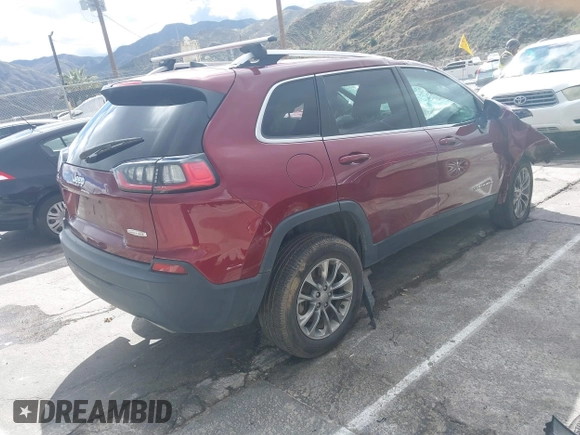2019 Jeep Cherokee Latitude Plus with VIN 1C4PJMLX8KD330606, listed as a IAAI auction lot 41733246 with 94,408 mi miles. Bid and sale history available at carsss.com. Image 4.