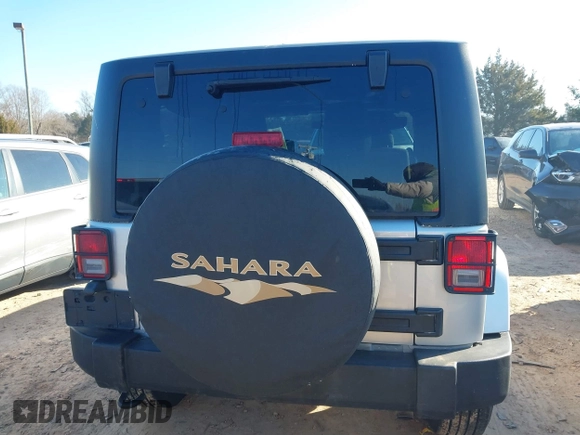 2011 Jeep Wrangler Sahara with VIN 1J4AA5D18BL639594, listed as a IAAI auction lot 41612096 with 138,624 mi miles and . Bid and sale history available at DreamBid. Image 16.