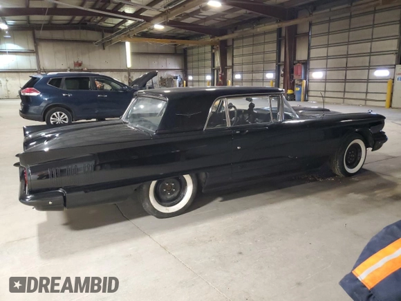 1960 Ford Thunderbird with VIN 0Y71Y188635, listed as a Copart auction lot 49905725 with 1,414 mi miles and Salvage Title. Bid and sale history available at DreamBid. Image 3.