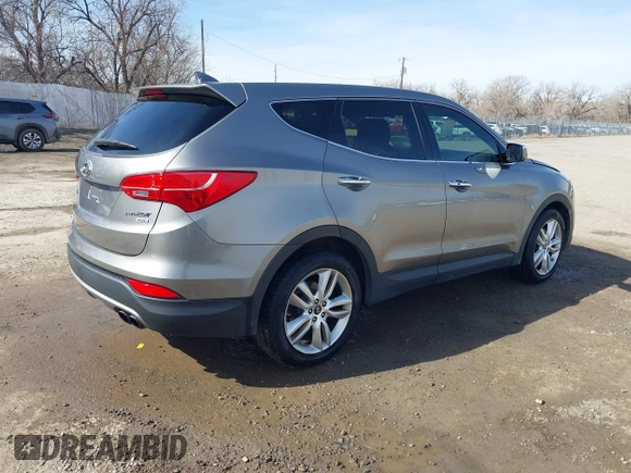 2013 Hyundai Santa Fe Sport z VIN 5XYZWDLA1DG003779, wystawiony jako IAAI lot #41761431 z przebiegiem 127 895 mil mil oraz . Historia ofert i sprzedaży dostępna na DreamBid. Obrazek 4.