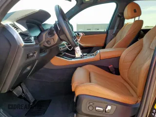 2023 BMW X5 xDrive40i with VIN 5UXCR6C01P9P27041, listed as a Copart auction lot 59009585 with 45,568 mi miles and Salvage title. Bid and sale history available at DreamBid. Image 7.