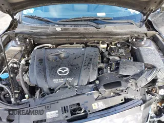 2016 Mazda Mazda3 i Sport with VIN 3MZBM1U77GM313559, listed as a IAAI auction lot 41489442 with 113,920 mi miles. Bid and sale history available at carsss.com. Image 10.