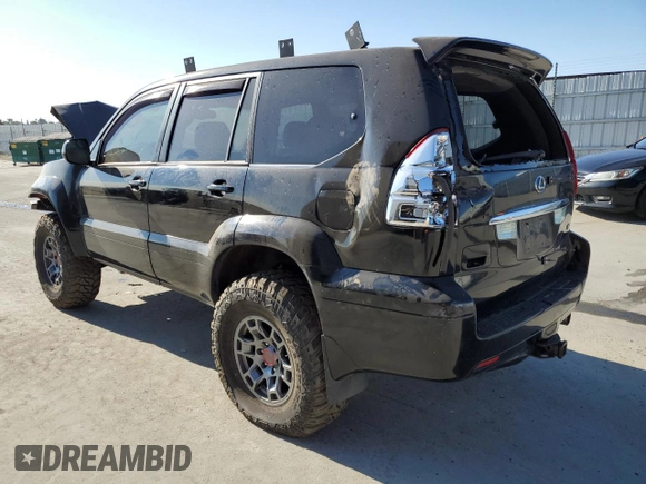 2005 Lexus GX 470 with VIN JTJBT20X650068722, listed as a Copart auction lot 62931984 with 247,819 mi miles and Salvage Title. Bid and sale history available at carsss.com. Image 2.