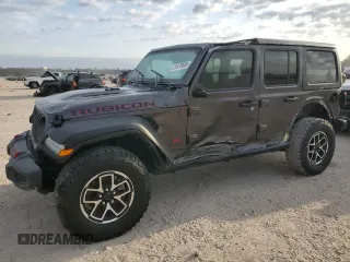 2024 Jeep Wrangler Rubicon with VIN 1C4PJXFG6RW261748, listed as a Copart auction lot 51479585 with 7,911 mi miles and Salvage Title. Bid and sale history available at DreamBid. Image 1.