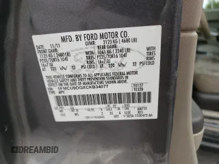 2012 Ford Escape XLT с VIN 1FMCU9DGXCKB34077, выставлен на аукционе Copart как лот 71502944 с пробегом 297 902 миль миль и Списание • Salvage title. История ставок и продаж доступна на DreamBid. Изображение 13.