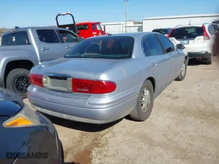 2005 Buick LeSabre Limited with VIN 1G4HR54K95U170239, listed as a IAAI auction lot 41855162 with 142,031 mi miles. Bid and sale history available at carsss.com. Image 4.