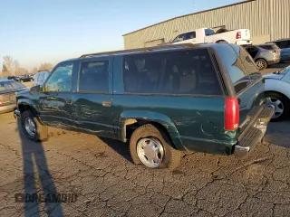 1997 GMC Suburban with VIN 3GKFK16RXVG513571, listed as a Copart auction lot 82086924 with 190,142 mi miles and Salvage title. Bid and sale history available at DreamBid. Image 2.