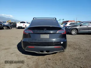 2022 Tesla Model Y Long Range z VIN 7SAYGDEE2NF391349, wystawiony jako Copart lot #85351924 z przebiegiem 5 670 mil mil oraz Szkoda całkowita • Salvage title. Historia ofert i sprzedaży dostępna na DreamBid. Obrazek 6.