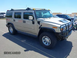 2003 Hummer H2 with VIN 5GRGN23U33H102150, listed as a IAAI auction lot 41892529 with 1 mi miles. Bid and sale history available at carsss.com. Image 1.