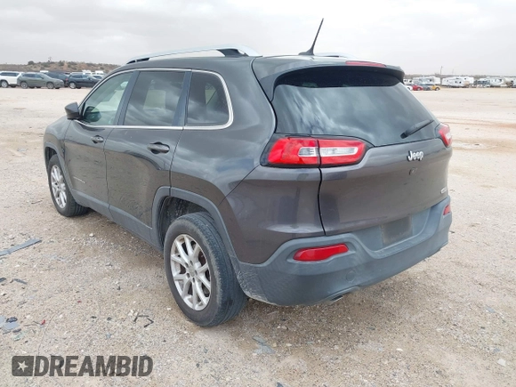 2014 Jeep Cherokee Latitude z VIN 1C4PJLCS1EW319194, wystawiony jako IAAI lot #41710491 z przebiegiem 108 136 mil mil oraz . Historia ofert i sprzedaży dostępna na DreamBid. Obrazek 3.