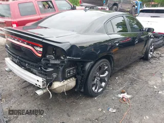2018 Dodge Charger SXT Plus with VIN 2C3CDXHG0JH289216, listed as a IAAI auction lot 42085449 with 90,902 mi miles and . Bid and sale history available at DreamBid. Image 4.