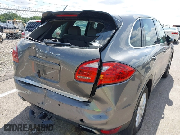 2014 Porsche Cayenne z VIN WP1AA2A2XELA91523, wystawiony jako IAAI lot #42538298 z przebiegiem 67 001 mil mil oraz . Historia ofert i sprzedaży dostępna na DreamBid. Obrazek 6.