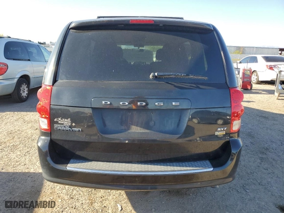 2016 Dodge Grand Caravan SXT with VIN 2C4RDGCG9GR380596, listed as a Copart auction lot 53657385 with 211,744 mi miles and Clean Title. Bid and sale history available at carsss.com. Image 6.