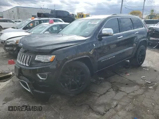 2014 Jeep Grand Cherokee Overland with VIN 1C4RJECG1EC556155, listed as a Copart auction lot 75641034 with 116,549 mi miles and Salvage Title. Bid and sale history available at carsss.com. Image 1.
