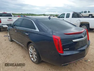 2013 Cadillac XTS Luxury with VIN 2G61P5S39D9182526, listed as a IAAI auction lot 42183995 with 132,778 mi miles. Bid and sale history available at carsss.com. Image 3.