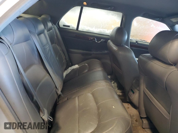 2002 Cadillac DeVille DTS with VIN 1G6KF57912U199809, listed as a Copart auction lot 87372504 with 154,663 mi miles and Salvage Title. Bid and sale history available at carsss.com. Image 10.