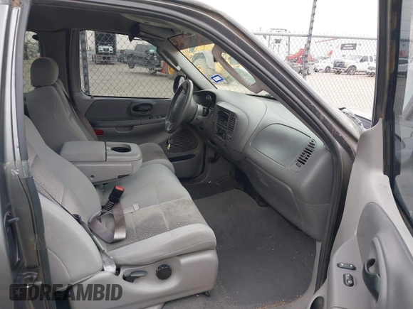2003 Ford F-150 XL with VIN 1FTRX07W33KB50920, listed as a IAAI auction lot 41742906 with 100,560 mi miles and . Bid and sale history available at DreamBid. Image 5.