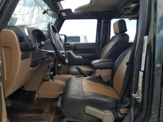 2012 Jeep Wrangler Unlimited Rubicon с VIN 1C4HJWFG4CL103531, выставлен на аукционе Copart как лот 48131665 с пробегом 183 234 миль миль и Списание • Salvage title. История ставок и продаж доступна на DreamBid. Изображение 7.