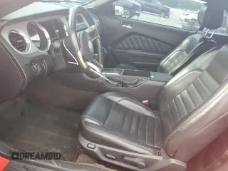 2013 Ford Mustang V6 with VIN 1ZVBP8EM0D5265005, listed as a Copart auction lot 54985425 with 128,964 mi miles and Salvage title. Bid and sale history available at DreamBid. Image 7.