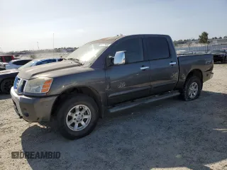 2005 Nissan Titan LE z VIN 1N6AA07B75N547069, wystawiony jako Copart lot #60098625 z przebiegiem 183 464 mil mil oraz Czysty tytuł • Clean title. Historia ofert i sprzedaży dostępna na DreamBid. Obrazek 1.