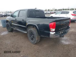 2017 Toyota Tacoma SR5 with VIN 5TFAZ5CN2HX040954, listed as a IAAI auction lot 41733137 with 97,780 mi miles and . Bid and sale history available at DreamBid. Image 3.