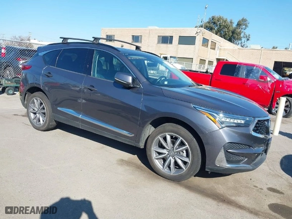 2019 Acura RDX w/Technology Pkg with VIN 5J8TC2H51KL000186, listed as a IAAI auction lot 41403335 with 140,920 mi miles. Bid and sale history available at carsss.com. Image 1.