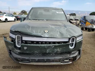 2023 Rivian R1T Adventure with VIN 7FCTGAAA2PN018657, listed as a Copart auction lot 75889434 with 14,342 mi miles and Salvage Title. Bid and sale history available at carsss.com. Image 5.