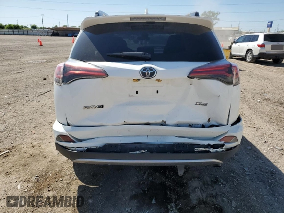 2018 Toyota RAV4 XLE with VIN JTMWFREV3JJ157552, listed as a Copart auction lot 51693335 with 100,907 mi miles and Salvage Title. Bid and sale history available at carsss.com. Image 6.
