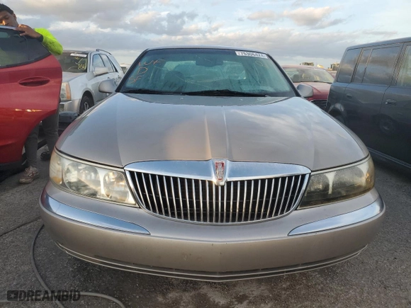 2000 Lincoln Continental with VIN 1LNHM97V3YY920453, listed as a Copart auction lot 76306424 with 117,912 mi miles and Non Repairable. Bid and sale history available at carsss.com. Image 5.