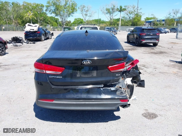 2017 Kia Optima EX with VIN 5XXGU4L35HG142807, listed as a IAAI auction lot 41856251 with 104,634 mi miles. Bid and sale history available at carsss.com. Image 16.
