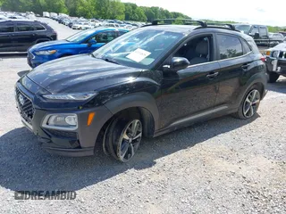 2020 Hyundai Kona Limited z VIN KM8K33A52LU591422, wystawiony jako IAAI lot #42324828 z przebiegiem 59 957 mil mil oraz . Historia ofert i sprzedaży dostępna na DreamBid. Obrazek 2.