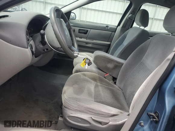 2006 Ford Taurus SE with VIN 1FAHP53296A241444, listed as a Copart auction lot 58343615 with 125,385 mi miles and Salvage title. Bid and sale history available at DreamBid. Image 7.