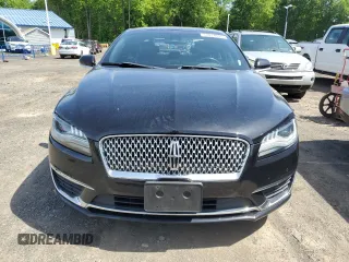 2019 Lincoln MKZ Reserve II z VIN 3LN6L5E90KR607021, wystawiony jako Copart lot #57874945 z przebiegiem 71 061 mil mil oraz Szkoda całkowita • Salvage title. Historia ofert i sprzedaży dostępna na DreamBid. Obrazek 5.