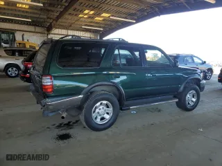 1999 Toyota 4Runner SR5 with VIN JT3HN86R0X0256050, listed as a Copart auction lot 46704965 with 200,353 mi miles and Salvage Title. Bid and sale history available at carsss.com. Image 3.