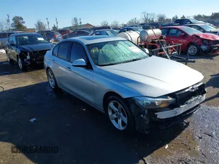 2013 BMW 3 Series 328i xDrive with VIN WBA3B5G51DNS05659, listed as a IAAI auction lot 41377886 with 159,972 mi miles. Bid and sale history available at carsss.com. Image 1.