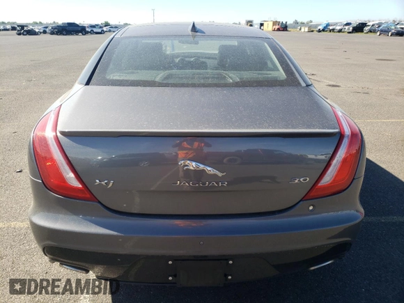 2017 Jaguar XJ with VIN SAJWA1C73H8W11256, listed as a Copart auction lot 49153633 with 12,199 mi miles. Bid and sale history available at carsss.com. Image 6.