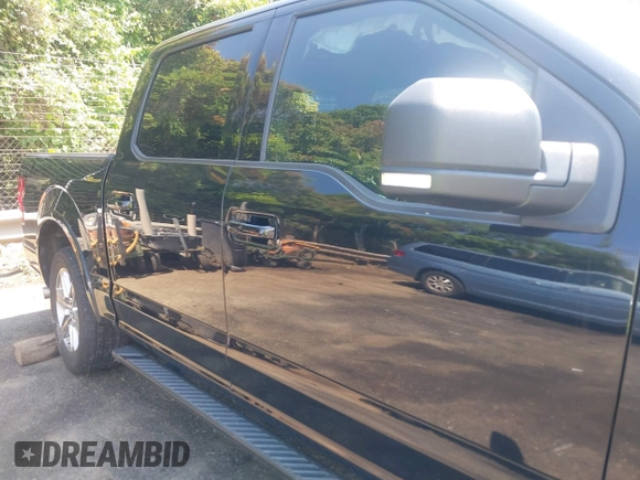 2018 Ford F-150 XL with VIN 1FTEW1EP2JFD51393, listed as a IAAI auction lot 42307408 with 141,478 mi miles and . Bid and sale history available at DreamBid. Image 13.