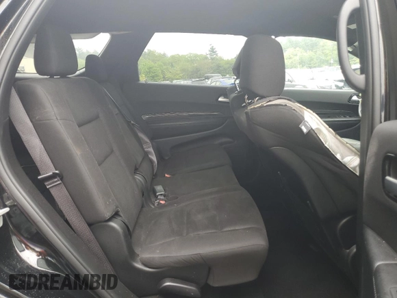 2023 Dodge Durango SXT with VIN 1C4RDHAG5PC634936, listed as a Copart auction lot 57282195 with 56,689 mi miles and Salvage title. Bid and sale history available at DreamBid. Image 11.