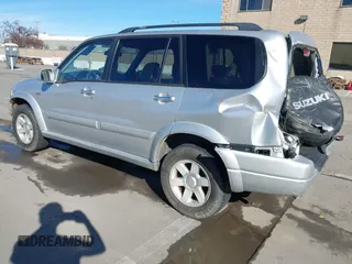 2003 Suzuki XL7 Touring z VIN JS3TX92V734114162, wystawiony jako IAAI lot #41250622 z przebiegiem 227 494 mil mil oraz . Historia ofert i sprzedaży dostępna na DreamBid. Obrazek 3.