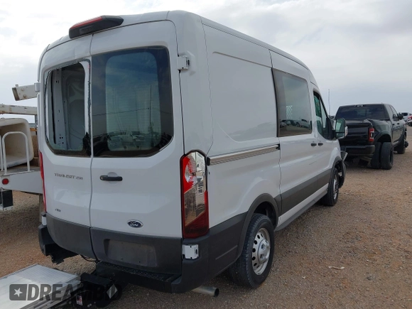 2023 Ford Transit Cargo with VIN 1FTBR2C83PKA71896, listed as a IAAI auction lot 42201228 with 31,427 mi miles and . Bid and sale history available at carsss.com. Image 4.