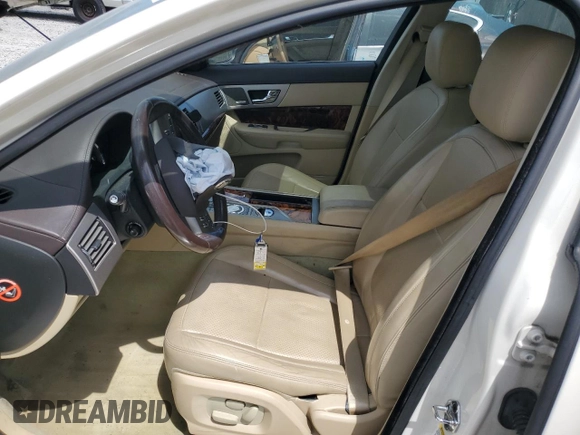 2009 Jaguar XF with VIN SAJXA06B79HR44382, listed as a Copart auction lot 53041205 with 121,245 mi miles and Salvage Title. Bid and sale history available at DreamBid. Image 7.
