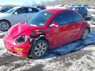 2010 Volkswagen New Beetle Coupe with VIN 3VWPG3AG8AM013467, listed as a IAAI auction lot 41364321 with 117,857 mi miles. Bid and sale history available at carsss.com. Image 2.