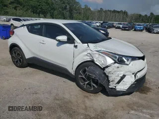 2018 Toyota C-HR XLE z VIN NMTKHMBX4JR031512, wystawiony jako Copart lot #55096715 z przebiegiem 100 522 mil mil oraz Szkoda całkowita • Salvage title. Historia ofert i sprzedaży dostępna na DreamBid. Obrazek 4.