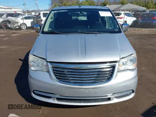 2011 Chrysler Town & Country Limited z VIN 2A4RR6DG1BR609818, wystawiony jako IAAI lot #41817330 z przebiegiem 160 482 mil mil oraz . Historia ofert i sprzedaży dostępna na DreamBid. Obrazek 13.