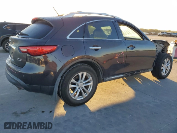 2013 Infiniti FX z VIN JN8CS1MU3DM140055, wystawiony jako Copart lot #80255094 z przebiegiem 153 575 mil mil oraz Szkoda całkowita • Salvage title. Historia ofert i sprzedaży dostępna na DreamBid. Obrazek 3.